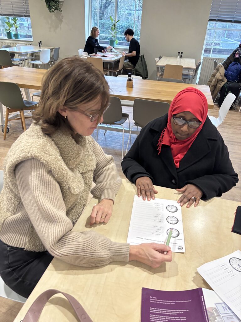 Helping refugees with learning Dutch?